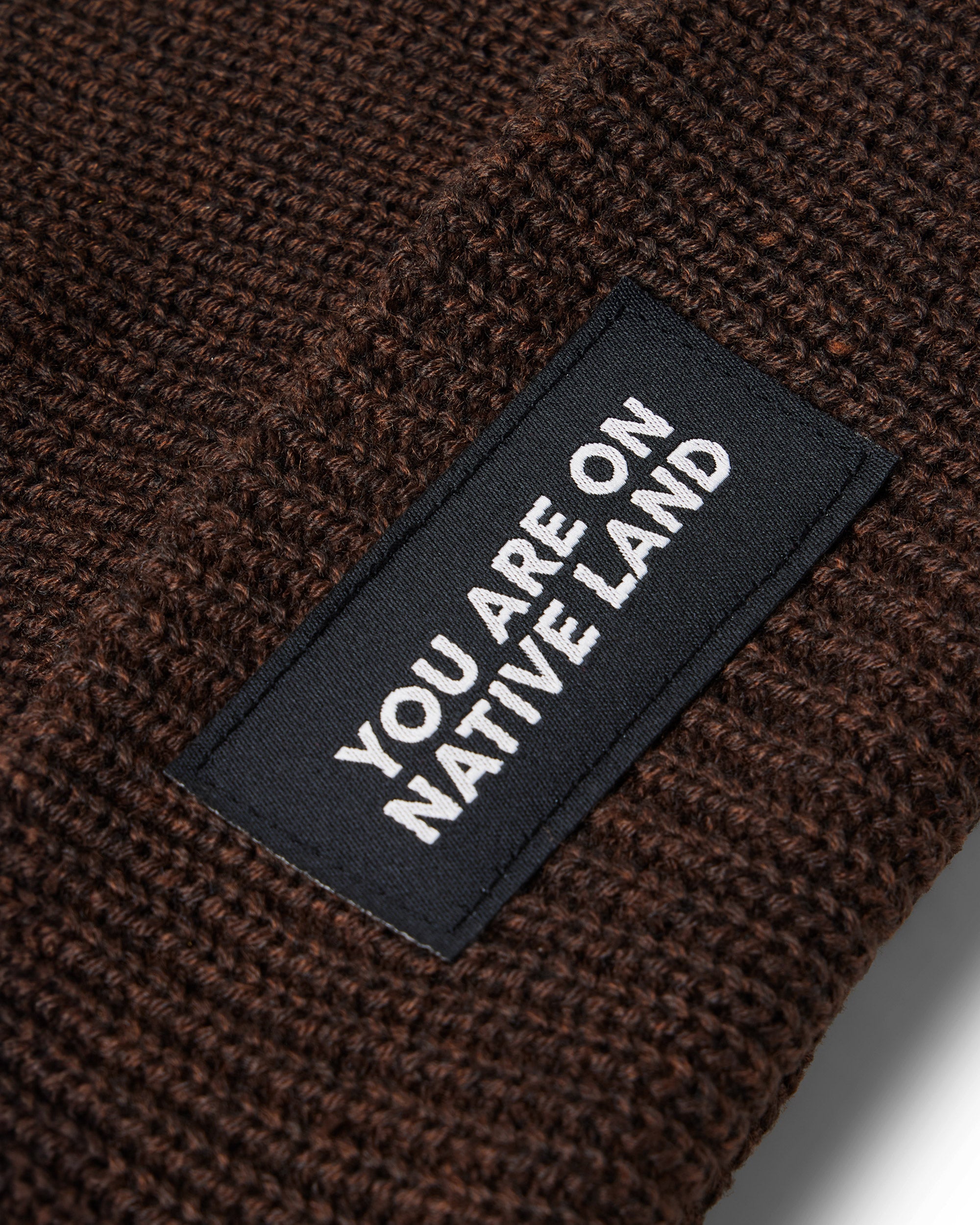 'YOU ARE ON NATIVE LAND' RIBBED BEANIE